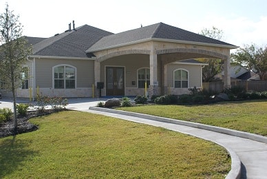 Lancaster Community Center exterior with covered entrance and landscaping